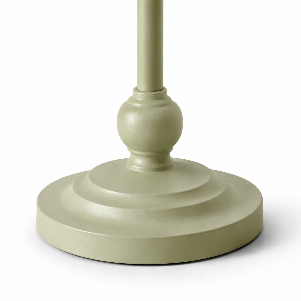 Layered sage green floor lamp base detail